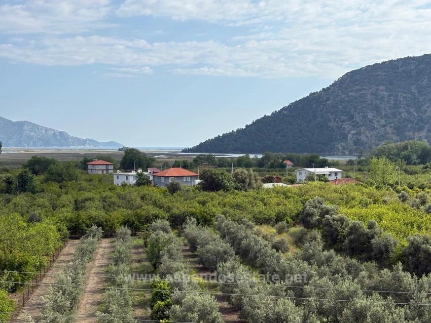 1.721 M² Großes Grundstück In Çandır Village Mit Meer- Und Seeblick Zu Verkaufen.
