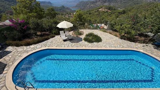 Villa 4+1 for sale with lake and sea view In Gökbel, Dalyan