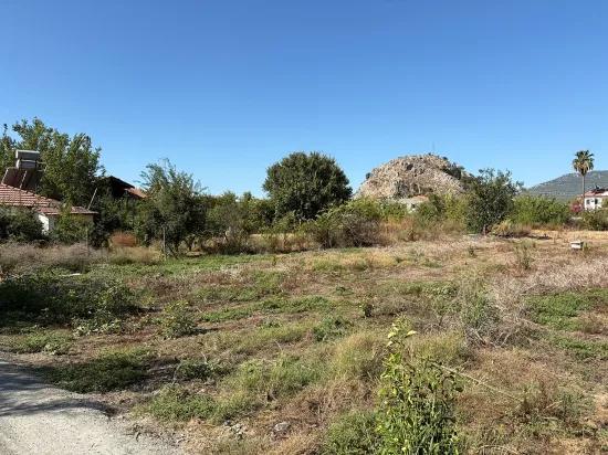 в Dalyan 3.180m2 %5 зонированный участок на продажу